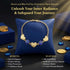 A 14k gold-filled bracelet with heart and blue evil eye charms offers style and protection, displayed among gold coins as a good luck charm.
